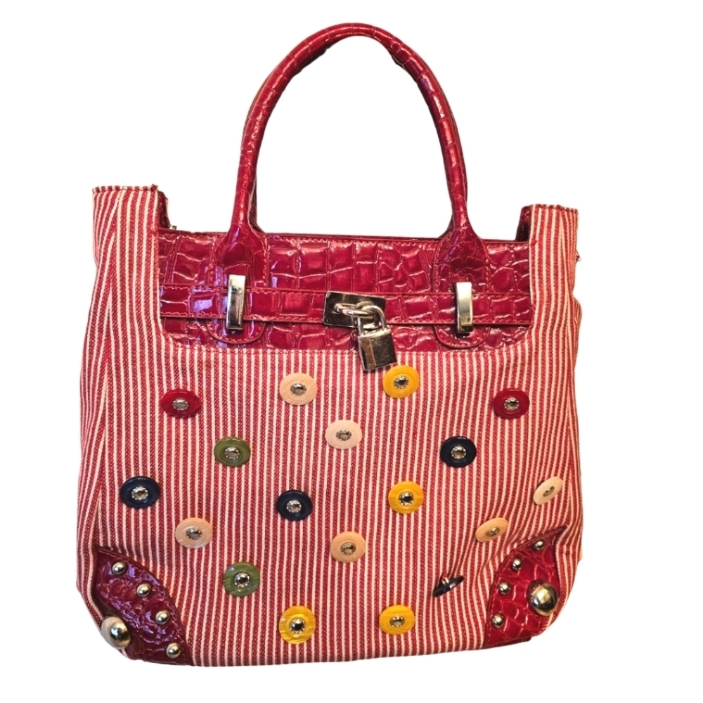 IN'S red and white striped bag with buttons and faux reptile.